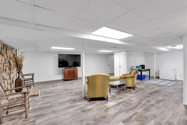 6863 Recreation Ln, Acworth, GA 30102 - living room with wood finished floors, baseboards, and a drop ceiling