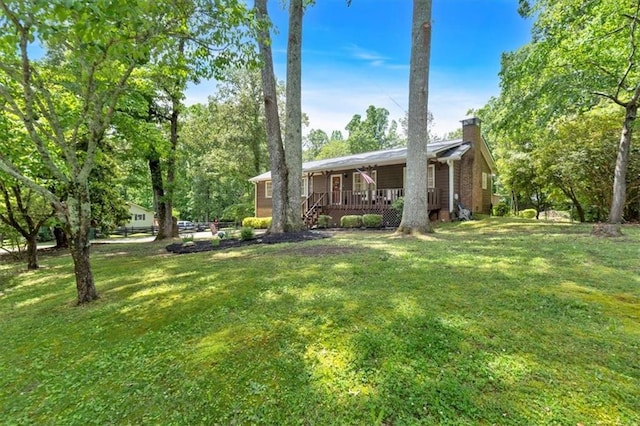 6863 Recreation Ln, Acworth, GA 30102 - view of green lawn featuring a deck