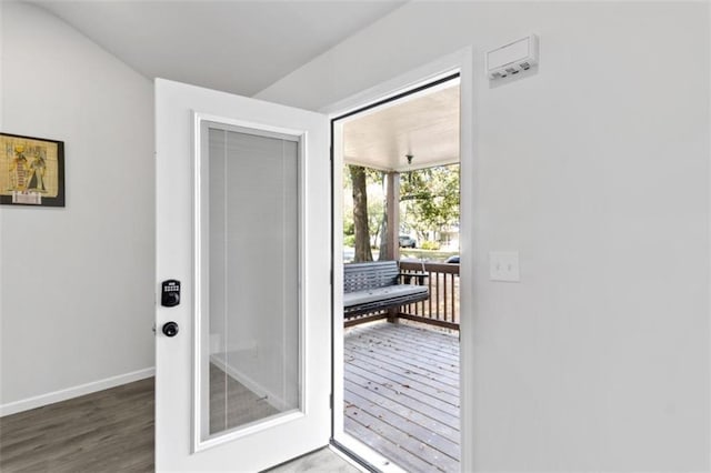 doorway featuring dark hardwood / wood-style floors