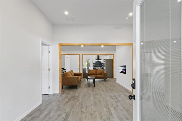 hall featuring light hardwood / wood-style floors