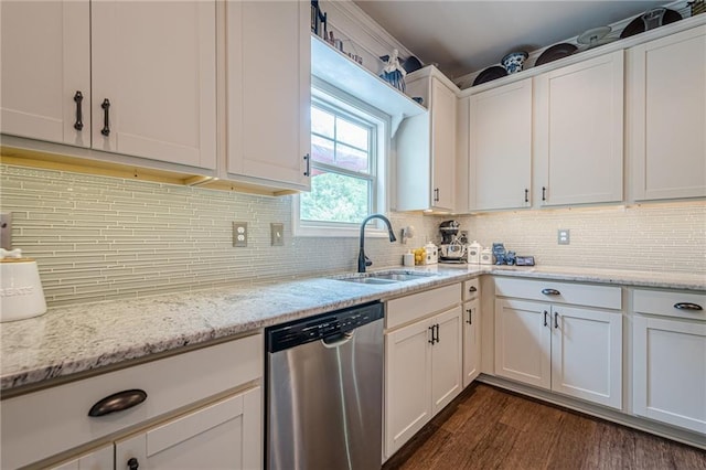 285 Turtle Rock Pl, Acworth, GA 30101 - kitchen featuring stainless steel dishwasher, a sink, white cabinets, and decorative backsplash