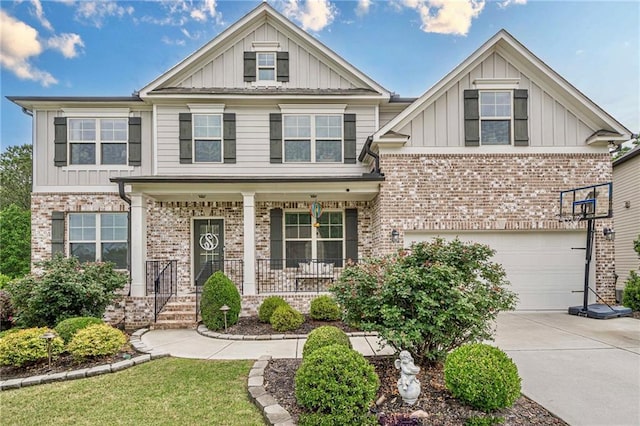 285 Turtle Rock Pl, Acworth, GA 30101 - craftsman-style house with board and batten siding, brick siding, a porch, and concrete driveway