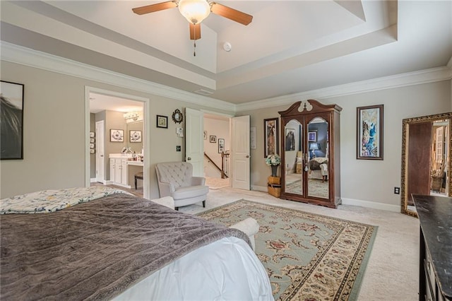 285 Turtle Rock Pl, Acworth, GA 30101 - bedroom with light carpet, crown molding, a tray ceiling, connected bathroom, and baseboards