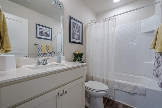 285 Turtle Rock Pl, Acworth, GA 30101 - bathroom featuring toilet, wood finished floors, shower / bathtub combination with curtain, and vanity