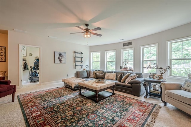 285 Turtle Rock Pl, Acworth, GA 30101 - living area featuring ceiling fan, light colored carpet, and baseboards