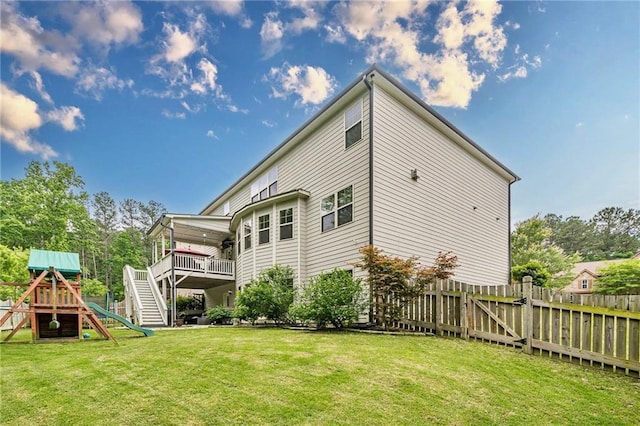 285 Turtle Rock Pl, Acworth, GA 30101 - back of property featuring a playground, a deck, and stairs