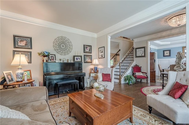 285 Turtle Rock Pl, Acworth, GA 30101 - living room featuring crown molding, stairway, wood finished floors, and a wainscoted wall