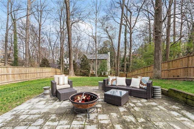 view of patio / terrace featuring an outdoor living space with a fire pit