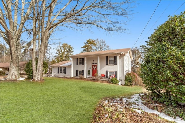 view of front of home with a front yard