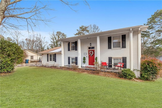 bi-level home with a front yard