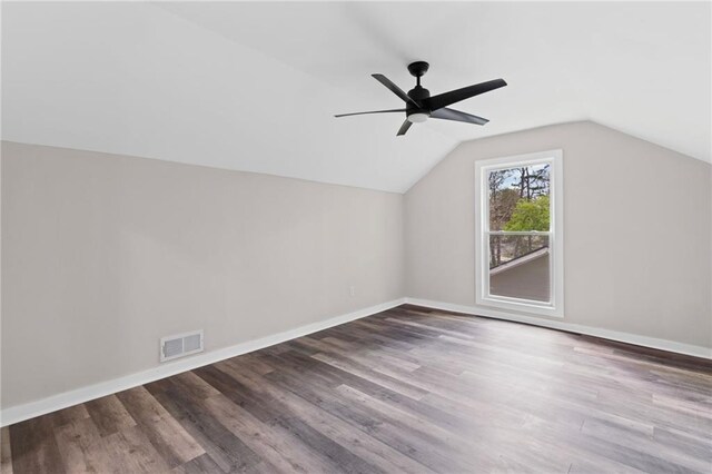599 Daniel Ave, Decatur, GA 30032 - additional living space with baseboards, lofted ceiling, visible vents, and wood finished floors