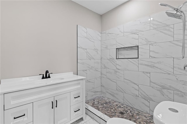 599 Daniel Ave, Decatur, GA 30032 - bathroom with vanity, marble finish floor, toilet, and tiled shower