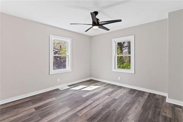 599 Daniel Ave, Decatur, GA 30032 - spare room with baseboards, visible vents, wood finished floors, and ceiling fan