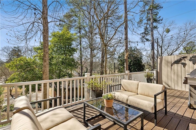 deck featuring outdoor lounge area