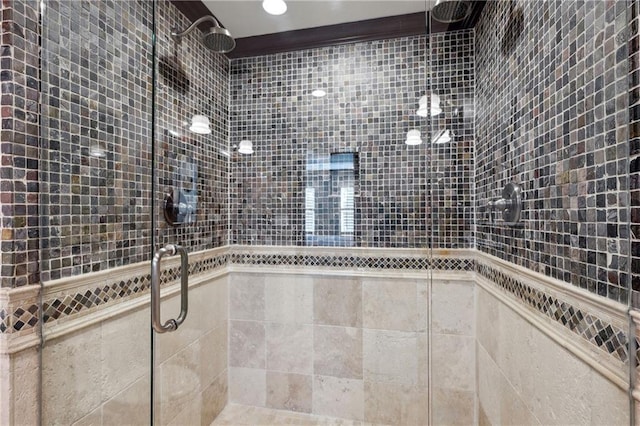 full bath featuring a shower stall