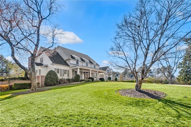 exterior space with a front lawn