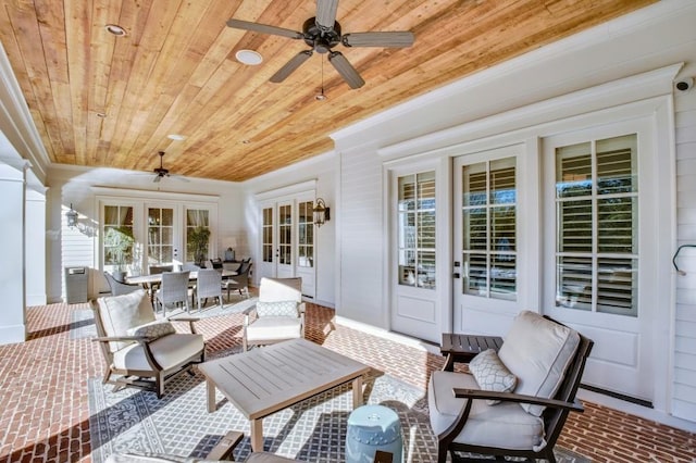 view of patio featuring a ceiling fan, french doors, and outdoor dining area