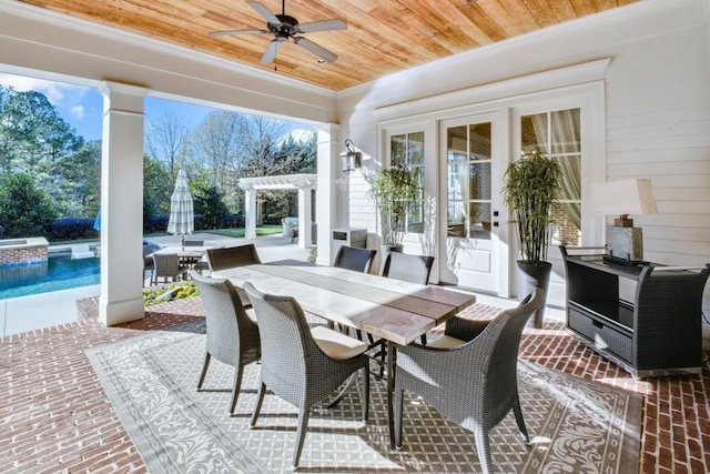 view of patio featuring ceiling fan, an outdoor pool, a pergola, and outdoor dining space