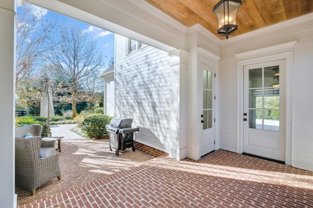 view of patio with a grill