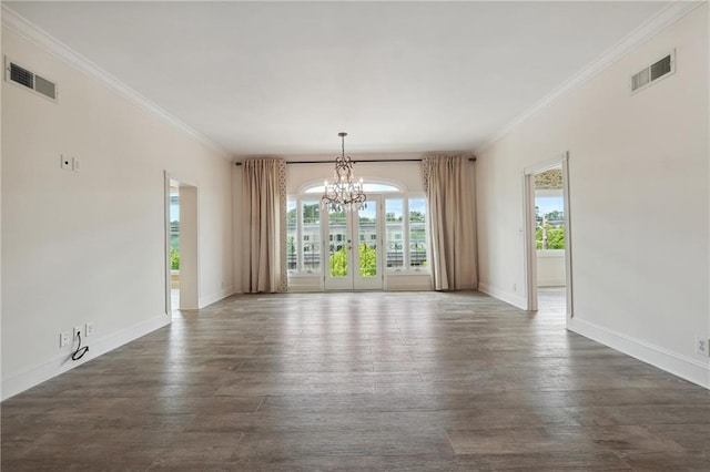 3636 Peachtree Rd NE Unit 405, Atlanta, GA 30319 - empty room featuring a chandelier, crown molding, and dark wood finished floors