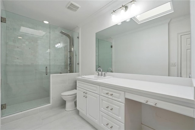 3636 Peachtree Rd NE Unit 405, Atlanta, GA 30319 - bathroom with crown molding, vanity, and a stall shower
