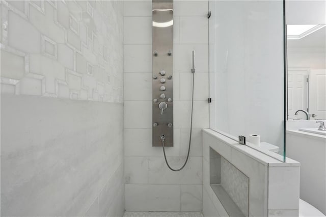 3636 Peachtree Rd NE Unit 405, Atlanta, GA 30319 - full bath featuring a walk in shower and vanity