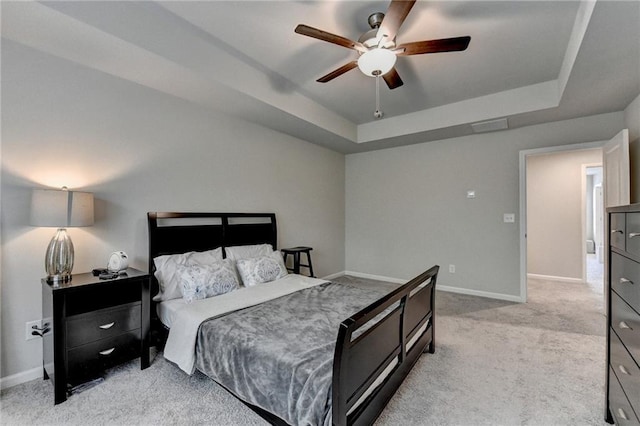 2719 Hedgeway Cir, Kennesaw, GA 30144 - bedroom with a raised ceiling, light carpet, and ceiling fan