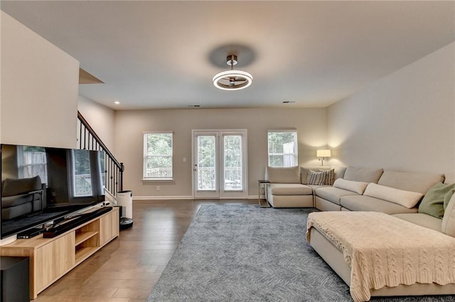 2719 Hedgeway Cir, Kennesaw, GA 30144 - living area with wood finished floors, plenty of natural light, stairs, and recessed lighting