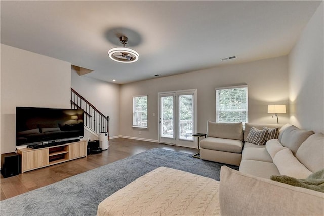2719 Hedgeway Cir, Kennesaw, GA 30144 - living room featuring wood finished floors and stairway