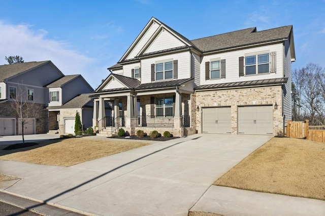 view of front of property featuring a porch and a garage