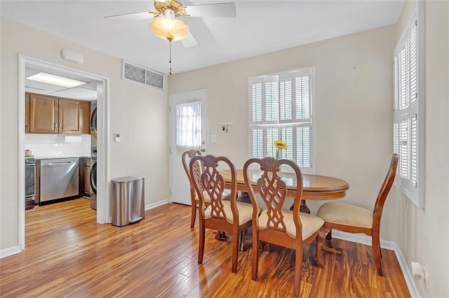 dining space featuring ceiling fan and light hardwood / wood-style floors