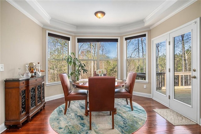6350 Old Wood Hollow Way, Buford, GA 30518 - dining area with ornamental molding, dark wood finished floors, and a raised ceiling