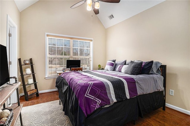 6350 Old Wood Hollow Way, Buford, GA 30518 - bedroom with wood finished floors, ceiling fan, and high vaulted ceiling