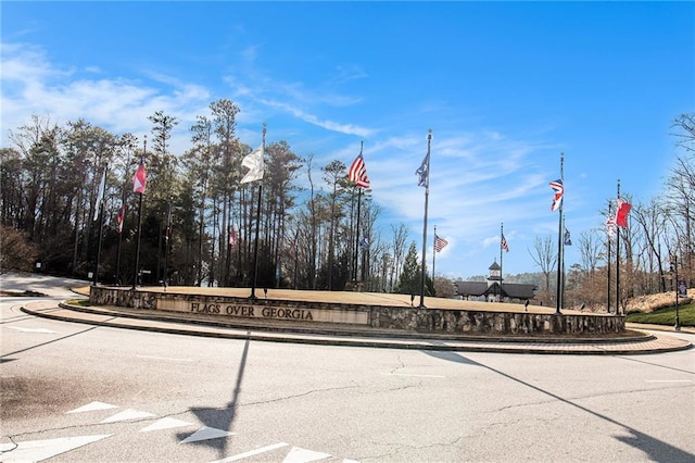 6350 Old Wood Hollow Way, Buford, GA 30518 - view of street featuring curbs and traffic signs