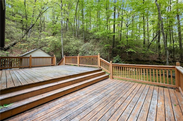 wooden terrace with a forest view