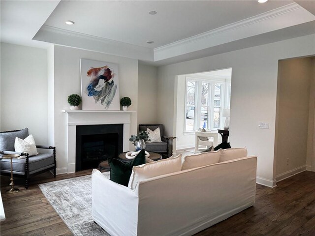 bedroom featuring crown molding, a raised ceiling, light carpet, and an inviting chandelier