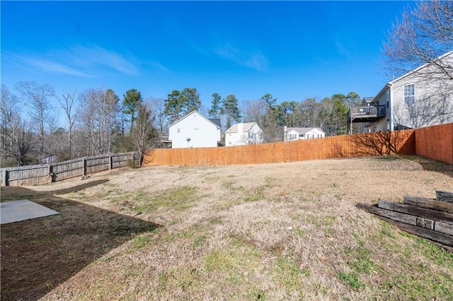 view of yard featuring a fenced backyard