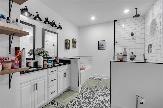 3088 Hiram Sudie Rd, Hiram, GA 30141 - bathroom with a bath, double vanity, walk in shower, and recessed lighting