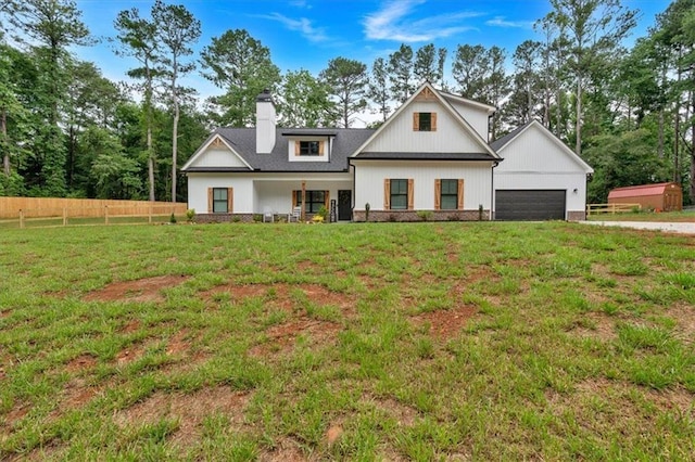3088 Hiram Sudie Rd, Hiram, GA 30141 - modern farmhouse style home featuring a chimney and a detached garage