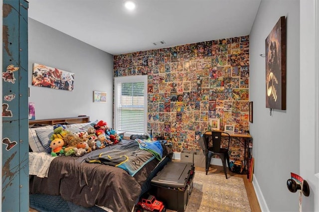3088 Hiram Sudie Rd, Hiram, GA 30141 - bedroom with an accent wall and wood finished floors
