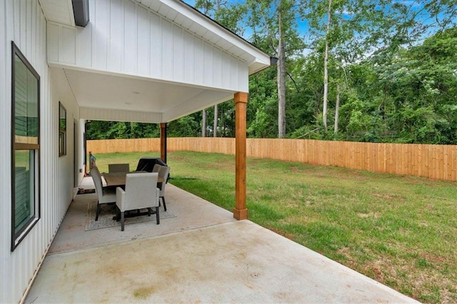 3088 Hiram Sudie Rd, Hiram, GA 30141 - fenced backyard with a patio area and outdoor dining space