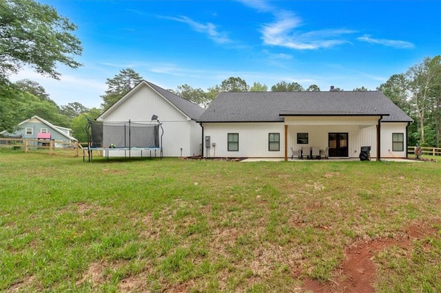 3088 Hiram Sudie Rd, Hiram, GA 30141 - rear view of property with a trampoline and a patio area