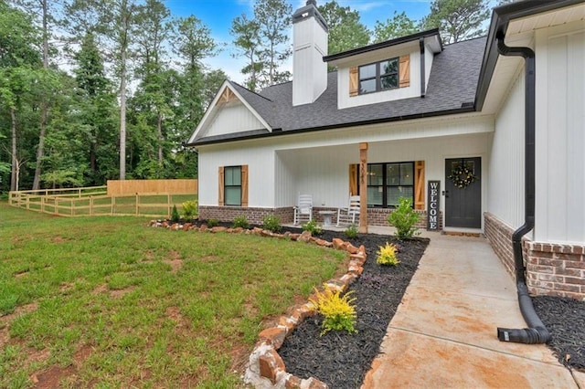3088 Hiram Sudie Rd, Hiram, GA 30141 - view of front of property featuring a chimney, covered porch, roof with shingles, and brick siding