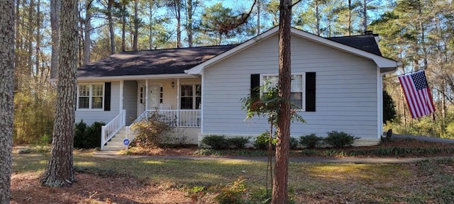 ranch-style house featuring a porch