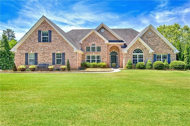 view of front of property with a front lawn