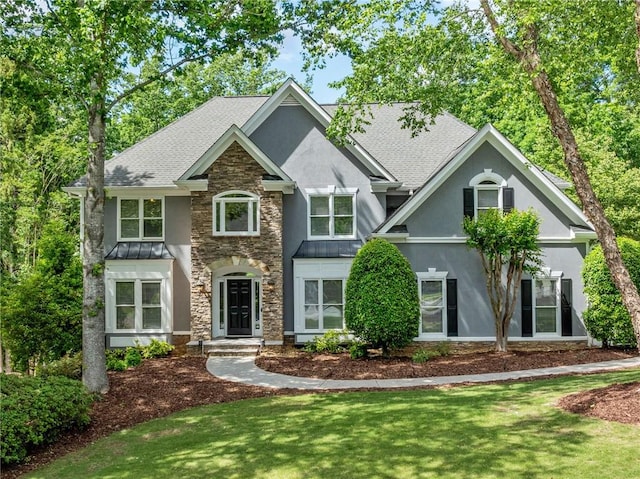 420 Big Bend Trl, Sugar Hill, GA 30518 - craftsman-style home with stucco siding, stone siding, a standing seam roof, and roof with shingles
