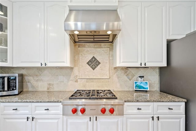 420 Big Bend Trl, Sugar Hill, GA 30518 - kitchen with wall chimney exhaust hood, stainless steel appliances, glass insert cabinets, and white cabinets
