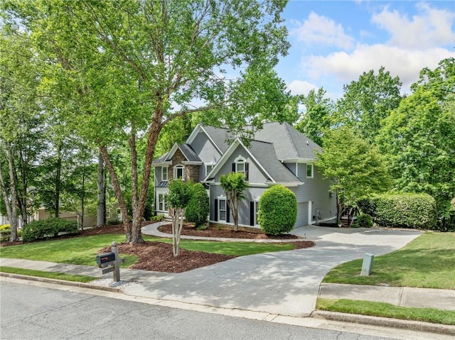 420 Big Bend Trl, Sugar Hill, GA 30518 - craftsman-style home with a front yard, concrete driveway, and an attached garage
