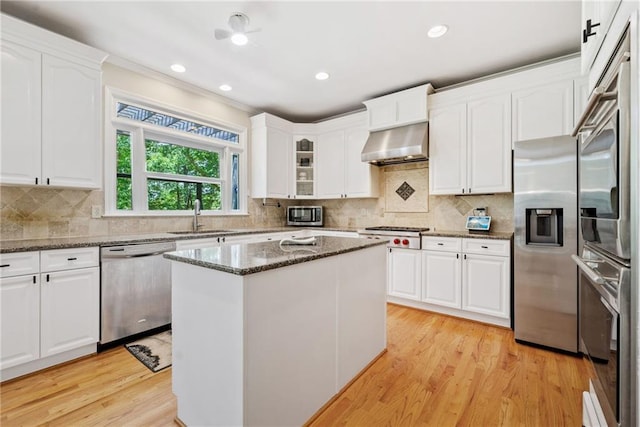420 Big Bend Trl, Sugar Hill, GA 30518 - kitchen with stainless steel appliances, extractor fan, a sink, white cabinets, and recessed lighting