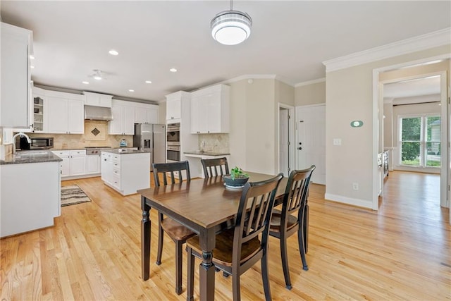 420 Big Bend Trl, Sugar Hill, GA 30518 - dining area featuring ornamental molding, light wood-style flooring, baseboards, and recessed lighting
